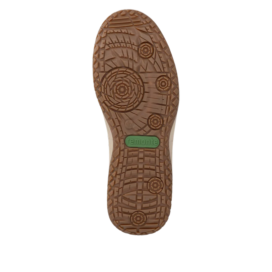 The brown rubber outsole of a shoe, showing a detailed tread pattern and a green 'emonts' brand logo tab, isolated on a white background.