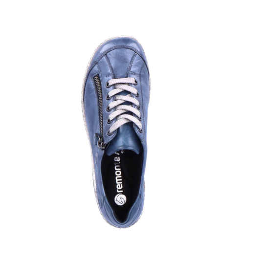 A single blue leather sneaker shown from a top-down view on a plain white background. The shoe features white laces, a side zipper, and the brand name 'remonte' printed in white on the black interior lining.