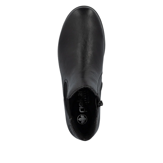 Black ankle boot on a white background