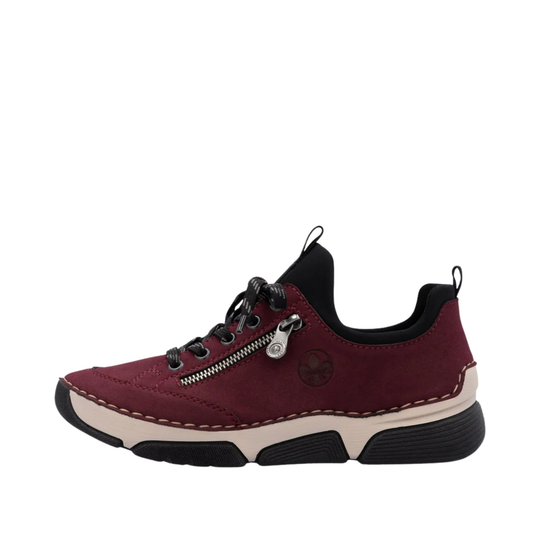 Maroon sneaker with black and beige accents on a white background