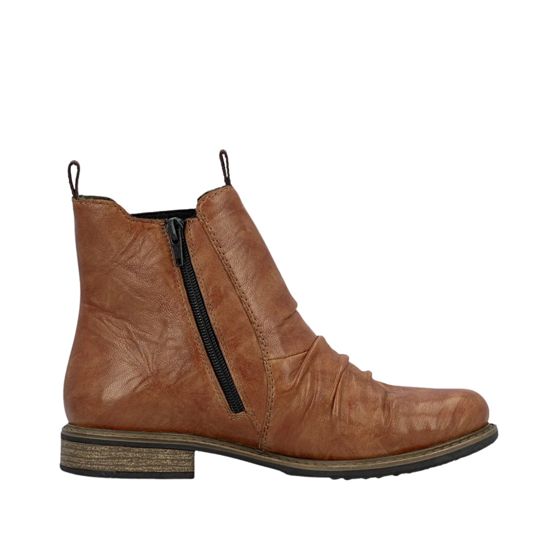 A single brown leather ankle boot with a side zipper, pull tabs, and a stacked block heel, shown in profile against a white background.