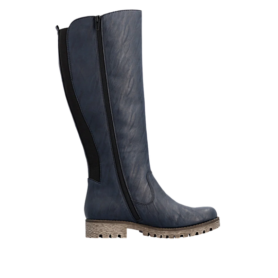 A single knee-high boot in dark navy blue textured leather, featuring a black side zipper and a chunky brown lug sole, shown against a plain white background.