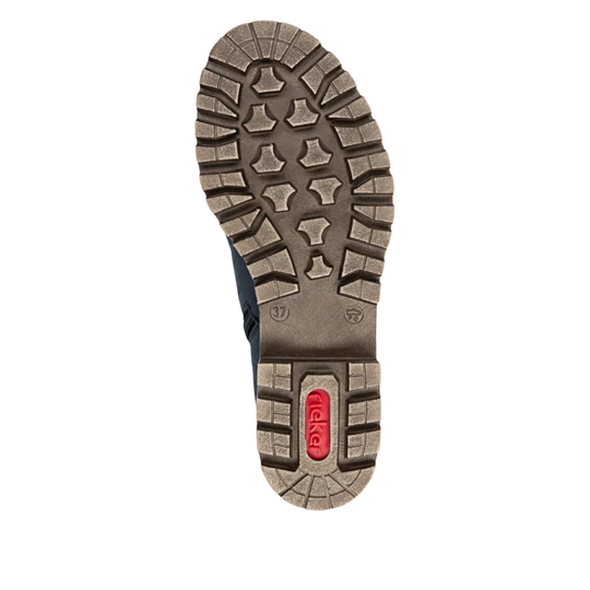 A top-down view of a single shoe's outsole, showing a rugged tread pattern in gray-brown with a red 'rieker' logo on the heel, set against a plain white background.