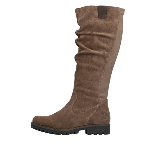 A single mid-calf brown suede boot with a slouchy, gathered upper and a chunky black lug sole, shown from a side profile on a white background.