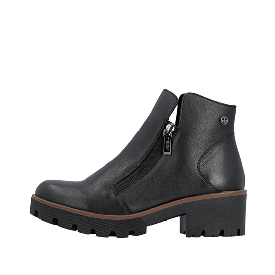 A black leather ankle boot with a side zipper, chunky brown midsole, and black lug sole, shown from a side profile on a white background.