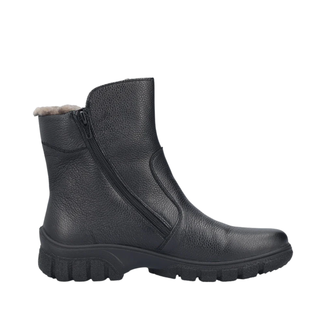 Black ankle boot with fur lining on a white background