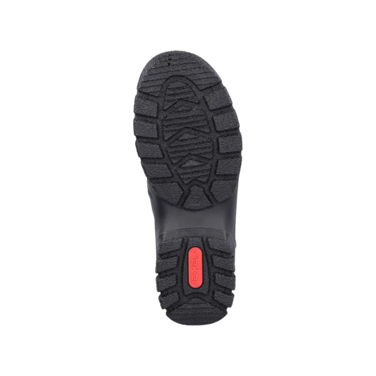 Black boot sole with red label on a white background
