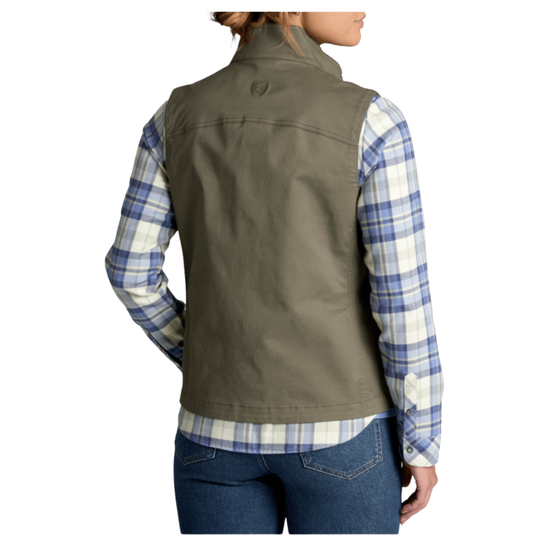 A woman shown from the back wearing an olive green sleeveless vest over a blue and white plaid flannel shirt, paired with blue jeans, against a plain white background.