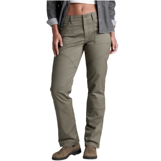 A model wearing a pair of olive green technical cargo pants, styled with a gray button-up shirt and brown boots against a plain white background.