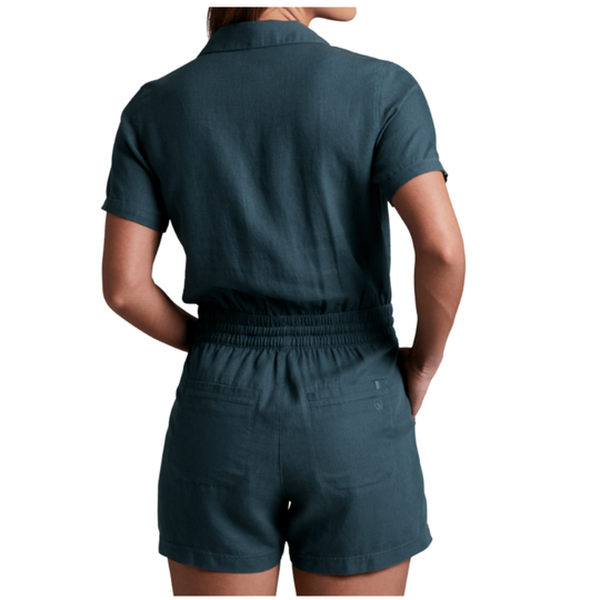 A woman shown from the back wearing a dark teal short-sleeve collared top and matching high-waisted shorts with an elastic waistband and back pockets, against a plain white background.