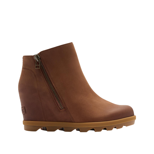 A brown leather wedge ankle boot with a side zipper, shown in profile against a plain white background.