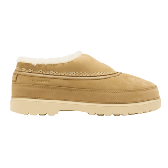 A brown nubuck leather shoe shown from a side profile view against a plain white background.