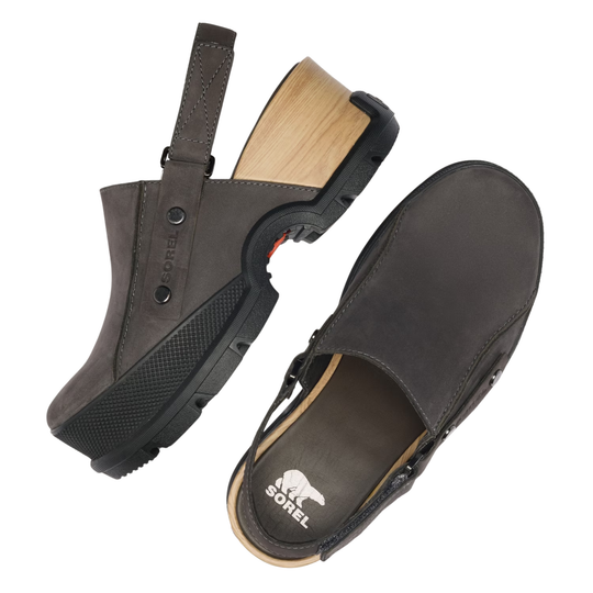 Two dark brown clogs from the brand Sorel, shown from different angles on a white background. One clog is shown from the side, revealing a light wood block heel, black sole, and brown strap.
