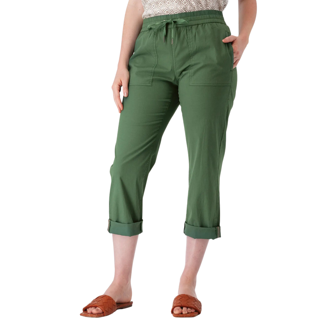 A model wearing olive green cropped pants with a drawstring waist and rolled cuffs, paired with brown slide sandals against a plain white background.