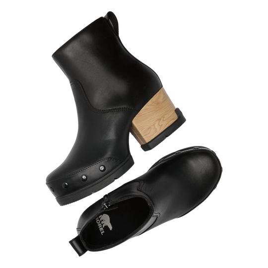 A pair of black leather ankle boots with a chunky wooden block heel and metal studs, shown from two angles on a white background.