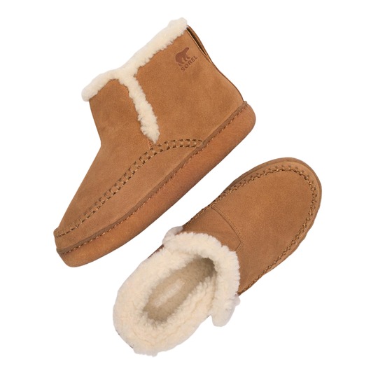 A pair of tan suede slip-on slippers with cream-colored shearling lining, shown from top and side angles on a white background. A brown bear logo with the word 'sorel' is visible on the side of the upper slipper.