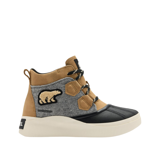 A mid-top platform sneaker featuring a tan leather upper, a gray felt side panel with a brown embroidered polar bear patch, black toe cap, and a thick cream-colored platform sole.