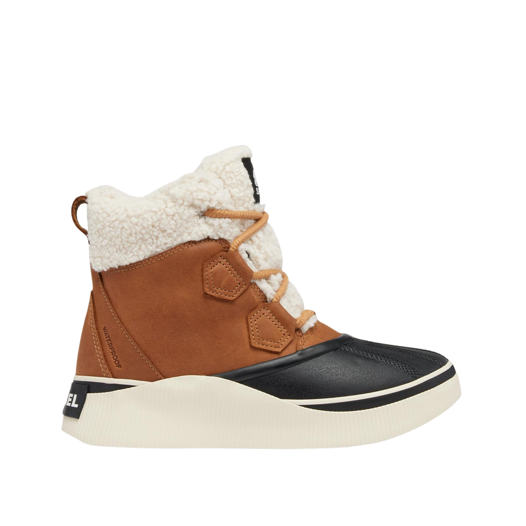 A single mid-height winter boot shown in profile against a solid white background. The boot features a tan suede upper, a thick cream-colored faux-shearling collar, tan laces, a black rubber toe cap, and a thick cream-colored platform sole.