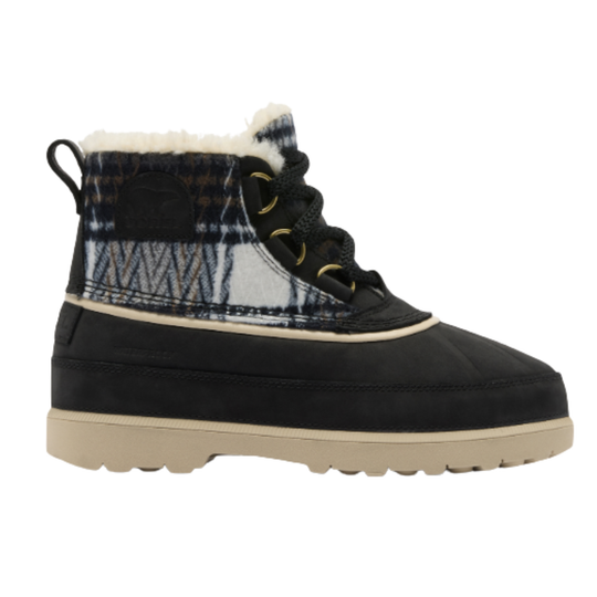 A single high-top winter boot shown in profile against a plain white background. The boot has a black suede-like toe and laces, a plaid collar in navy, white, and gray, a cream-colored faux-fur lining, and a thick beige sole.