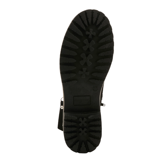 Close-up of a gray shoe sole with tread pattern on a white background