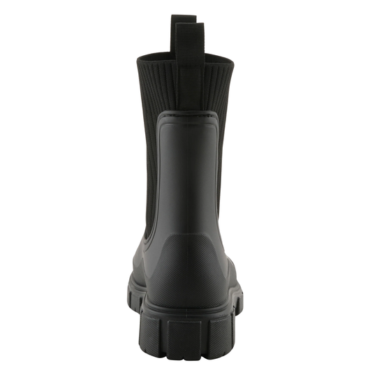 A single black rubber Chelsea-style boot shown from the back, featuring a textured sole, a ribbed elastic side panel, and a pull tab at the top, set against a plain white background.