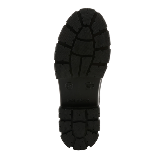 Black shoe sole with tread pattern on a white background