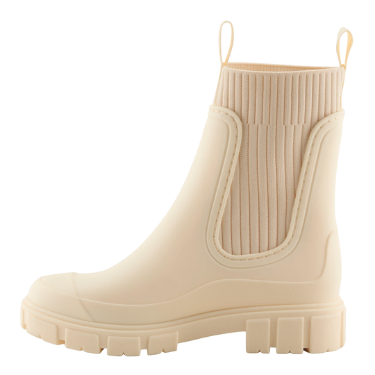 A single light beige rubber rain boot with a ribbed elastic side panel and pull tabs at the top, shown from a side profile on a white background.