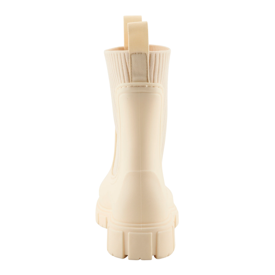 A single off-white rubber boot with a ribbed elastic side panel and a pull tab at the top, shown from a rear three-quarter view on a solid white background.