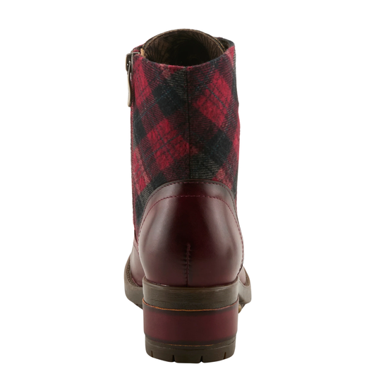 Plaid ankle boot with brown leather sole on a white background