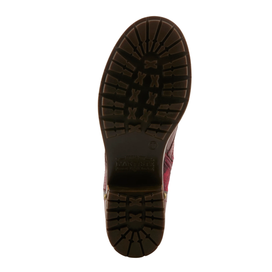 Boot sole with tread pattern on a white background