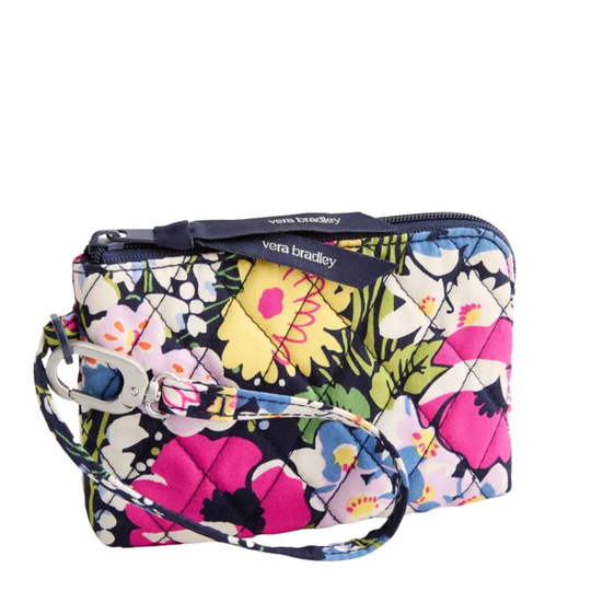 Vera Bradley floral quilted zip pouch with a wristlet strap, featuring a vibrant multicolor print of pink, yellow, blue, and white flowers on a dark background.