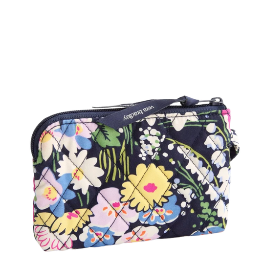 Vera Bradley floral quilted zip pouch, featuring a vibrant multicolor print of pink, yellow, blue, and white flowers on a dark background.