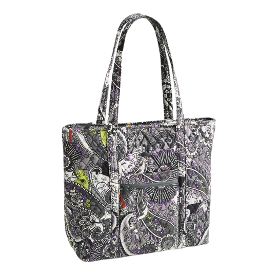 A tote bag featuring an intricate black, white, and gray paisley pattern with small accents of purple, red, and lime green, shown on a plain white background.