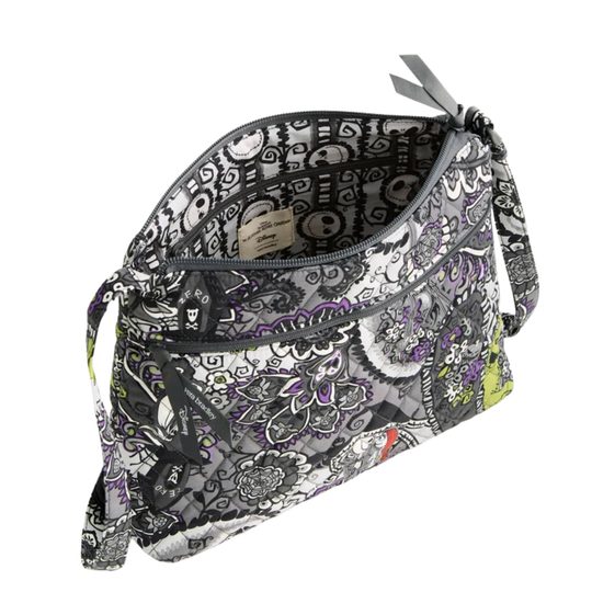 A crossbody bag with a black, white, and gray gothic floral pattern, featuring purple and lime green accents, shown open against a white background.