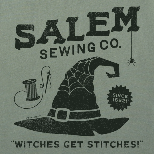 Vintage-style Salem Sewing Co. graphic print featuring a large witch hat with cobweb details, a spool of thread, a spider hanging from the corner, and the text 'SALEM SEWING CO.