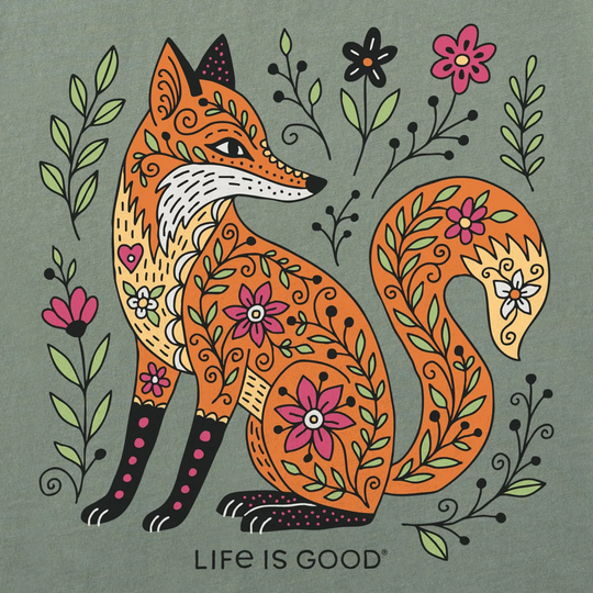 A stylized illustrated fox surrounded by decorative flowers and leaves on a muted green background, with the text 'LIFE IS GOOD' below the artwork.