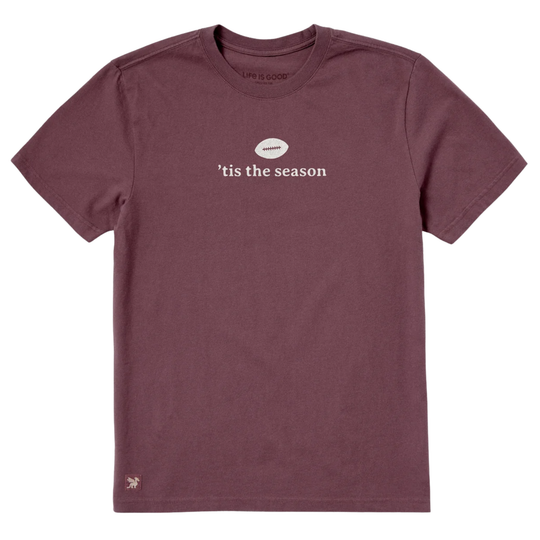 A short-sleeve crewneck t-shirt in heathered dusty mauve with a white graphic on the chest. The graphic features a small white football with the word 'amateur' inside, above the text ''tis the season' in white.