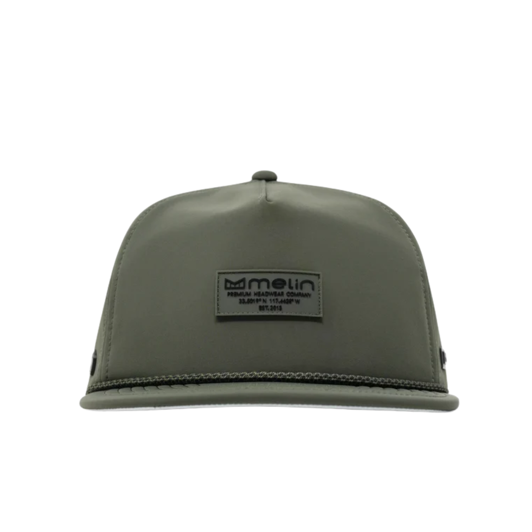 An olive green flat-brim cap with a black rectangular 'melin' brand patch on the front, shown against a plain white background.