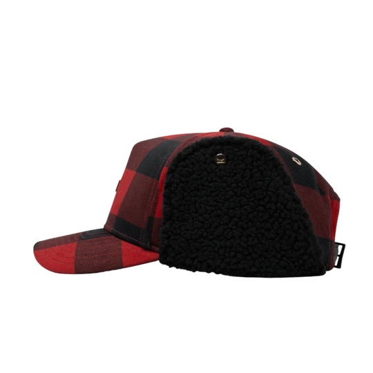 A red and black buffalo plaid winter trapper hat with black fleece ear flaps, shown against a plain white background.