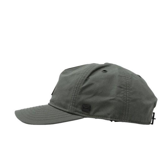 An olive green five-panel baseball cap with a black rectangular logo patch on the front that reads 'M'. The cap is photographed from the front against a solid white background.