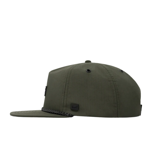Green perforated cap with chain detail on a white background