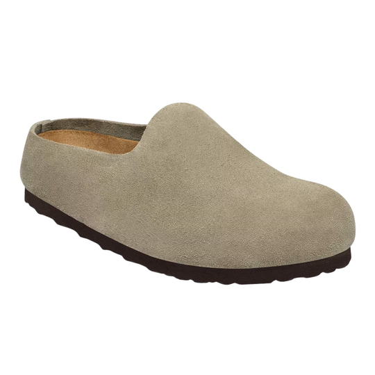 A single slip-on clog shoe in light taupe suede with a dark brown sole, shown from a three-quarters angle on a white background.