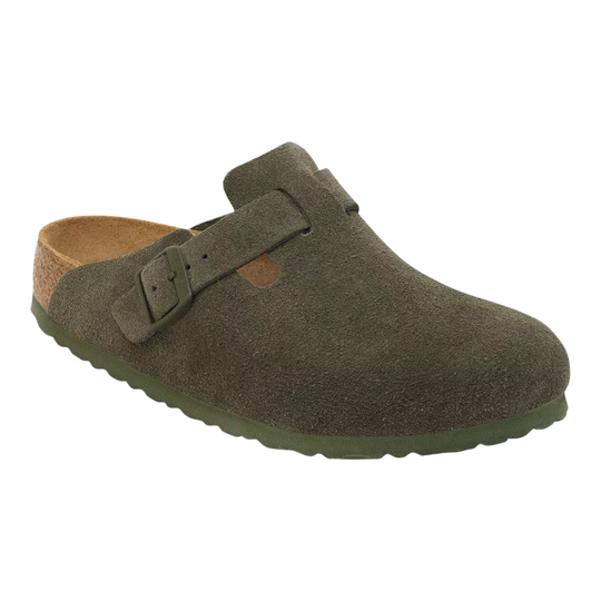 An olive green clog shoe with a suede-like finish, featuring a single adjustable strap with a buckle closure, a cork-look midsole, and a solid green outsole, shown against a plain white background.