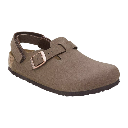 A single taupe-brown clog shoe with a suede-like finish, adjustable strap, and metallic buckle, shown on a plain white background.