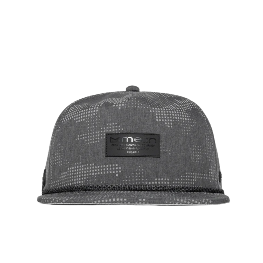 A dark gray patterned snapback cap with a black rectangular patch on the front displaying the 'melin' brand logo, shown against a plain white background.