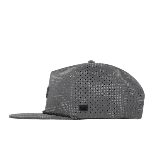 A dark gray patterned snapback cap with a black rectangular patch on the front displaying the 'melin' brand logo, shown against a plain white background.