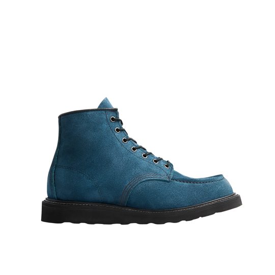 A single blue suede lace-up boot with a black sole, shown in a side profile on a solid white background.