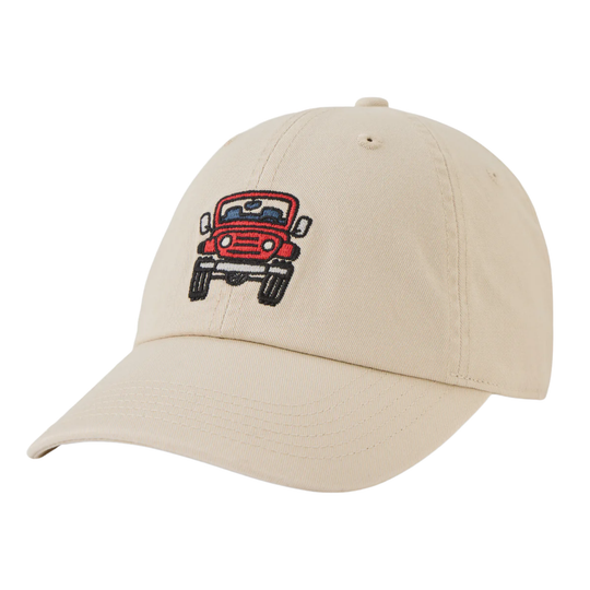 A beige baseball cap featuring an embroidered red vintage truck on the front panel, set against a plain white background.