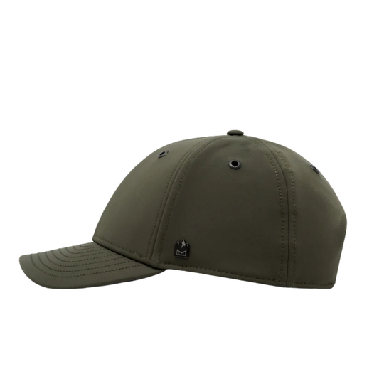An olive green baseball cap shown from a side profile view against a solid white background. The cap features a curved brim, structured six-panel crown, ventilation eyelets, and a small black embroidered logo on the side.