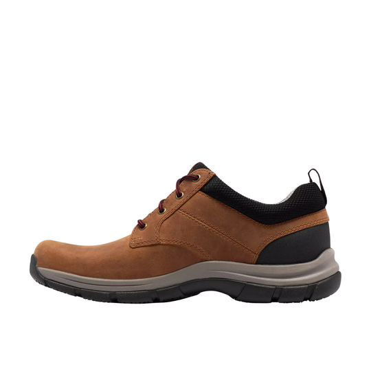 A brown suede lace-up shoe with black mesh lining, a black heel cap, and a gray midsole, shown in profile against a white background.